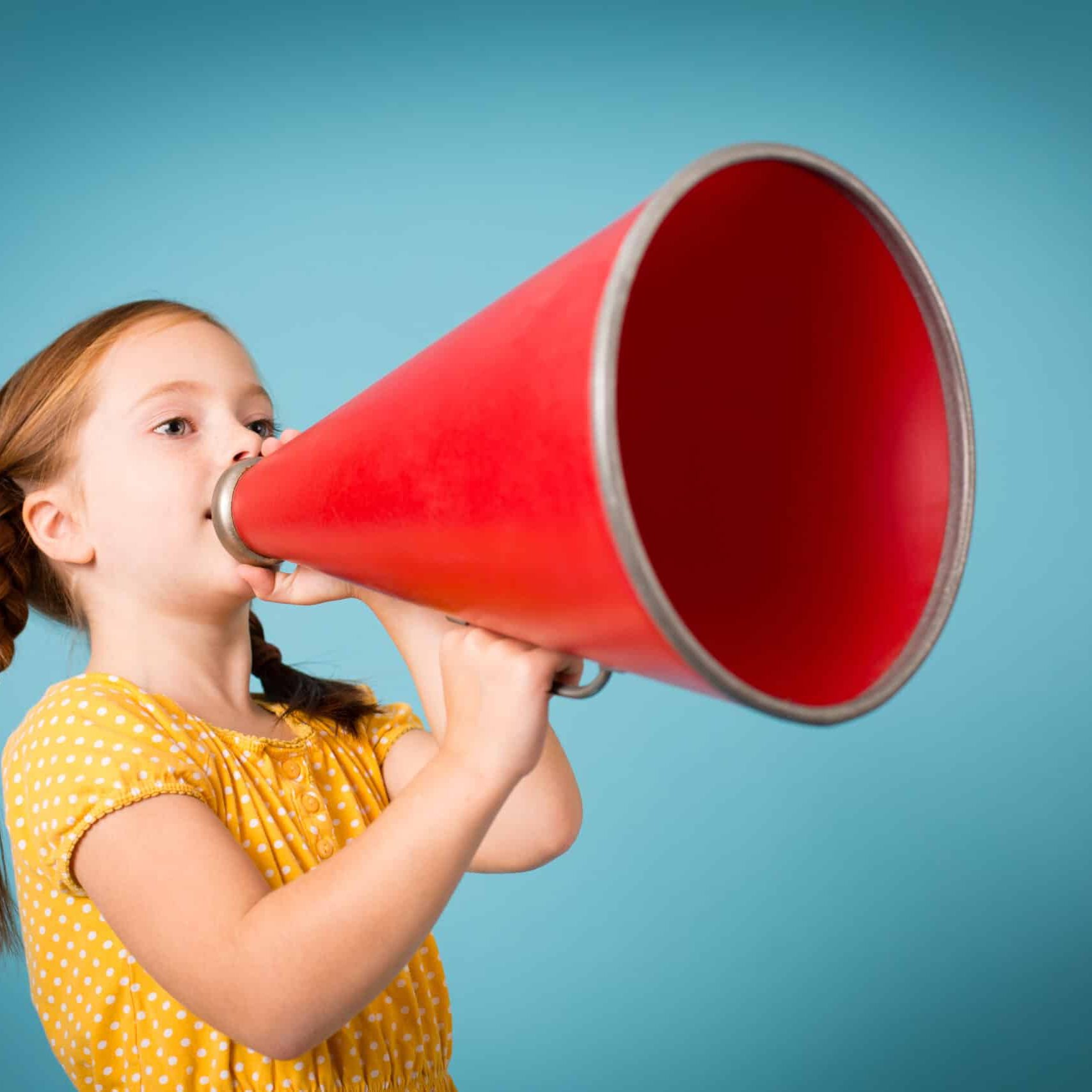 Girl Announcing with Megaphone, Isolated on Teal